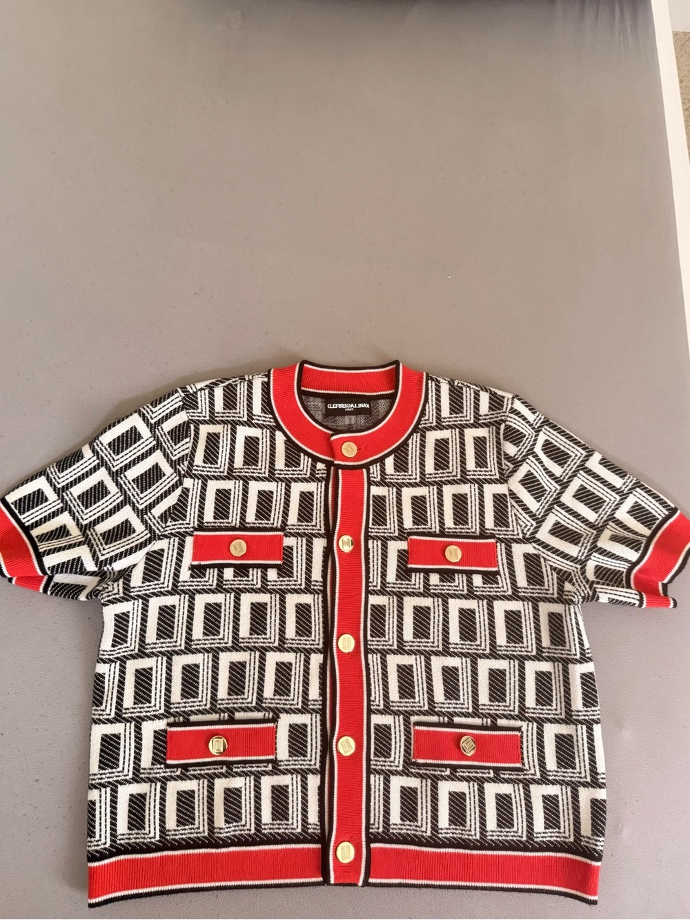Karl Lagerfeld
Geometric Knit Top with Red Trim size M